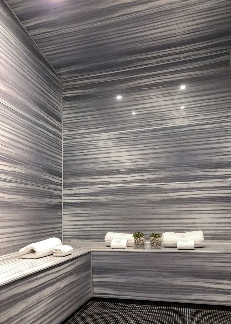 Steam room lined in Light and Shadow Trascenda slabs