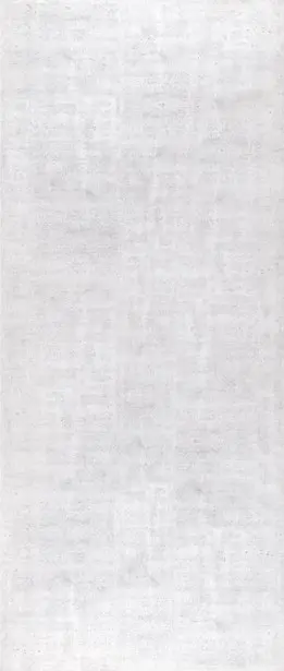 Trascenda Portland White slab design — light honed concrete look